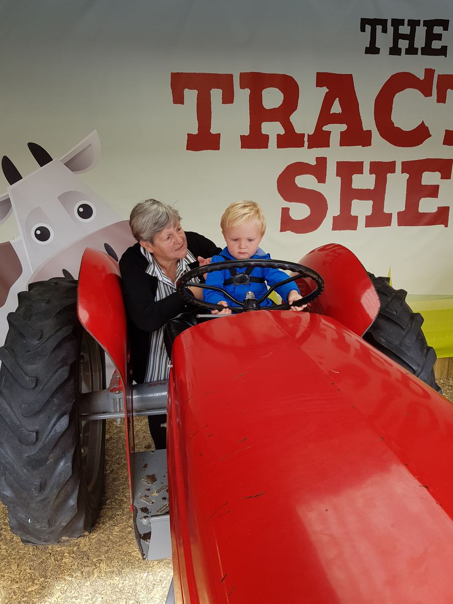 At the tractor shed